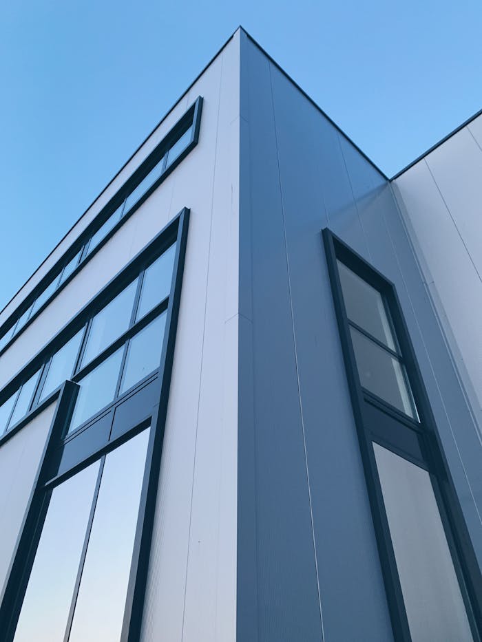 Sleek modern architecture featuring glass windows, captured in Alkmaar, Netherlands.